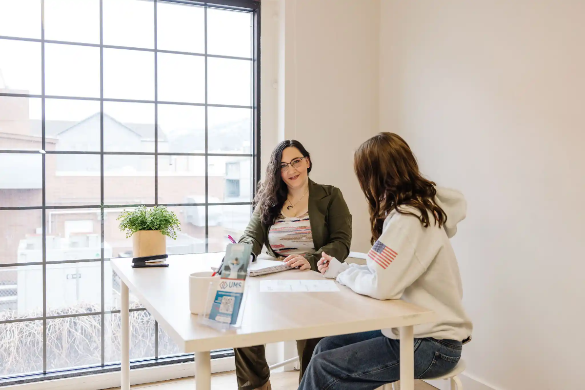 faith-emily-customer-service-hvac-utah Emily managing client scheduling and support for heating and cooling services in South Ogden.