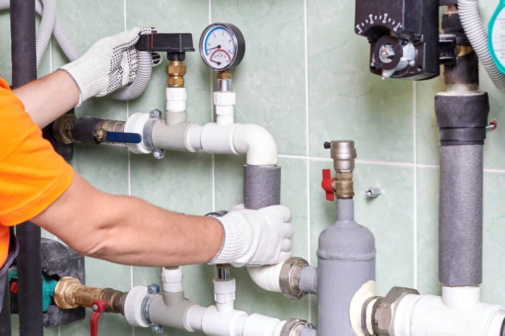 Commercial Plumber working