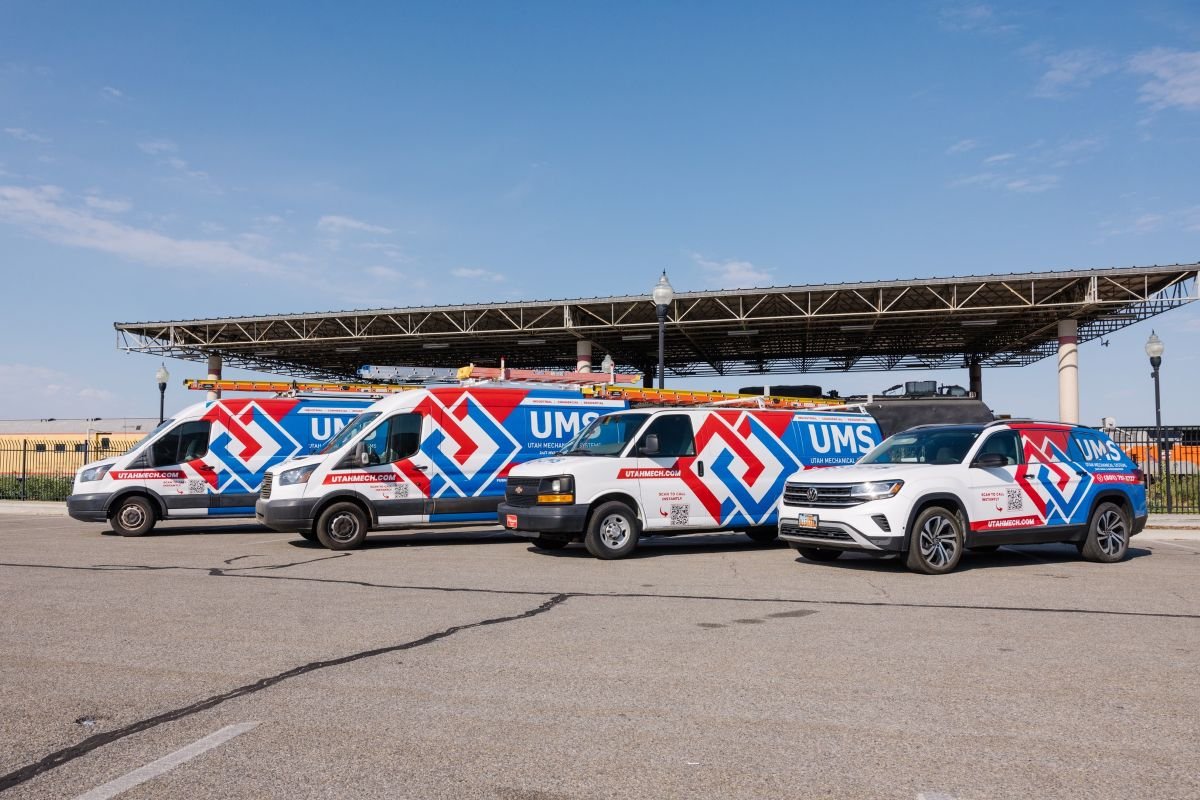 Utah Mechanical Systems HVAC service vans parked in South Ogden, Utah, ready for residential heating and air conditioning repair and installation