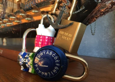 Close-up of combination locks and puzzle elements inside CLUE Inn Escape Room located in South Ogden