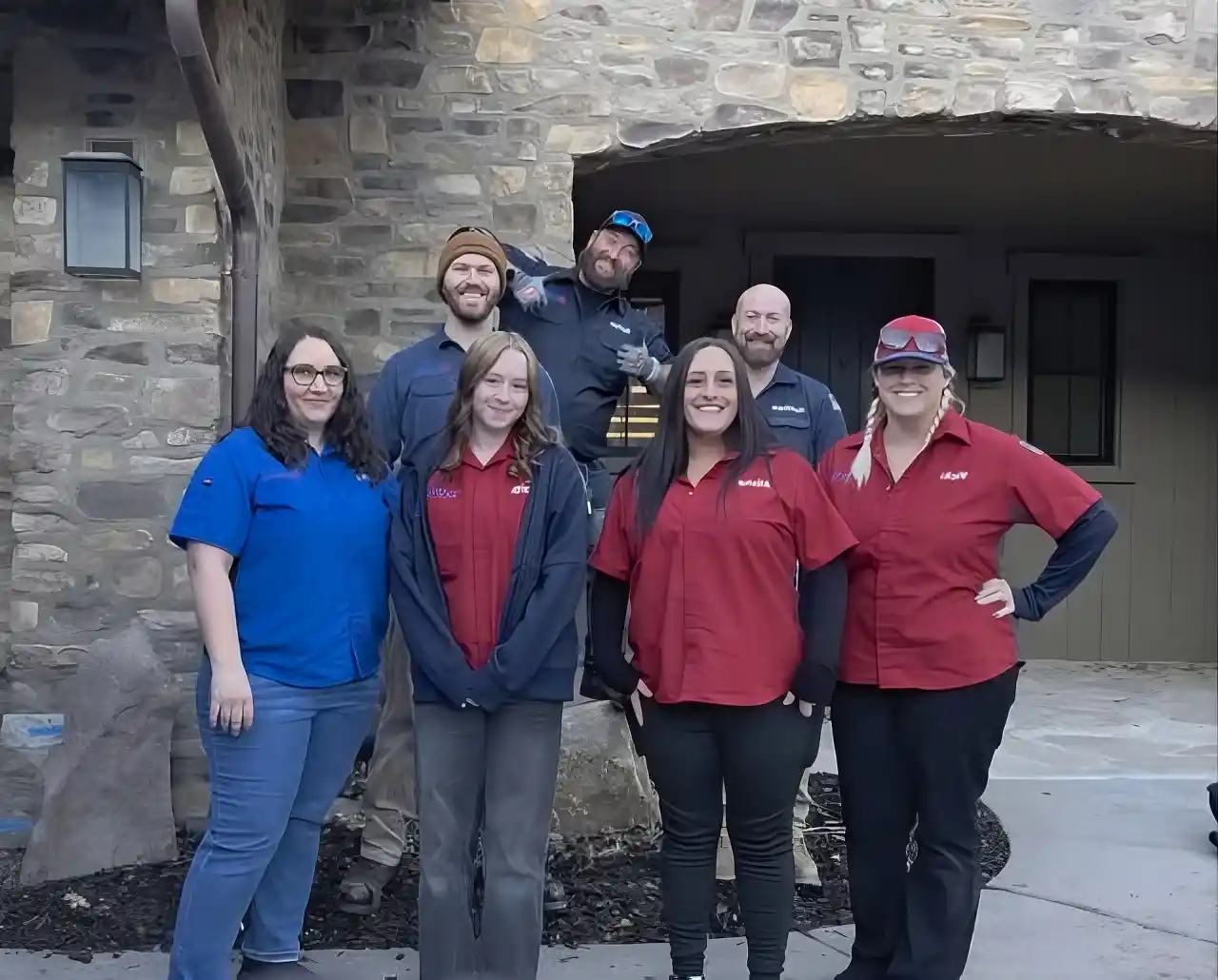 Licensed HVAC, plumbing, and refrigeration technicians from Utah Mechanical Systems standing outside a customer’s home in South Ogden Utah, proudly serving Ogden, North Ogden, Layton, Syracuse and all of Northern Utah.